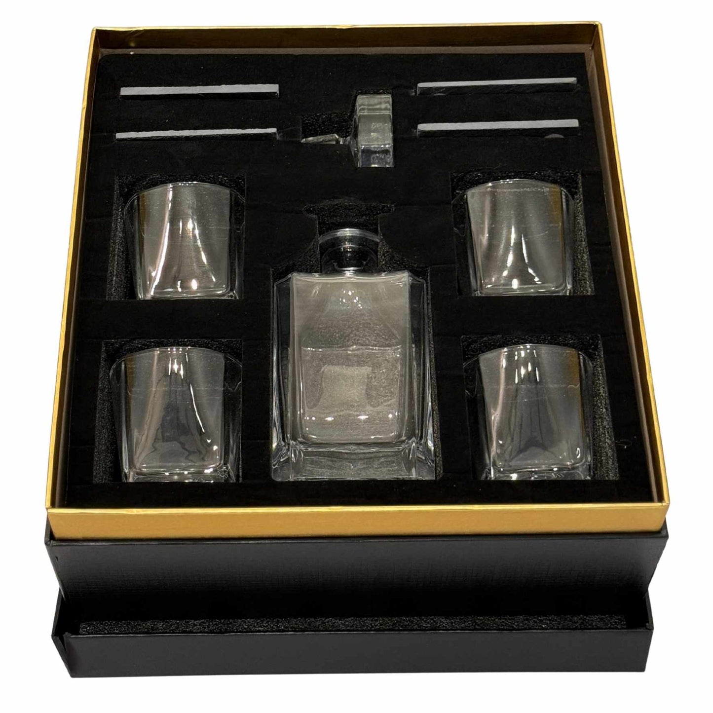 Glass decanter set with four glasses in a black and gold box