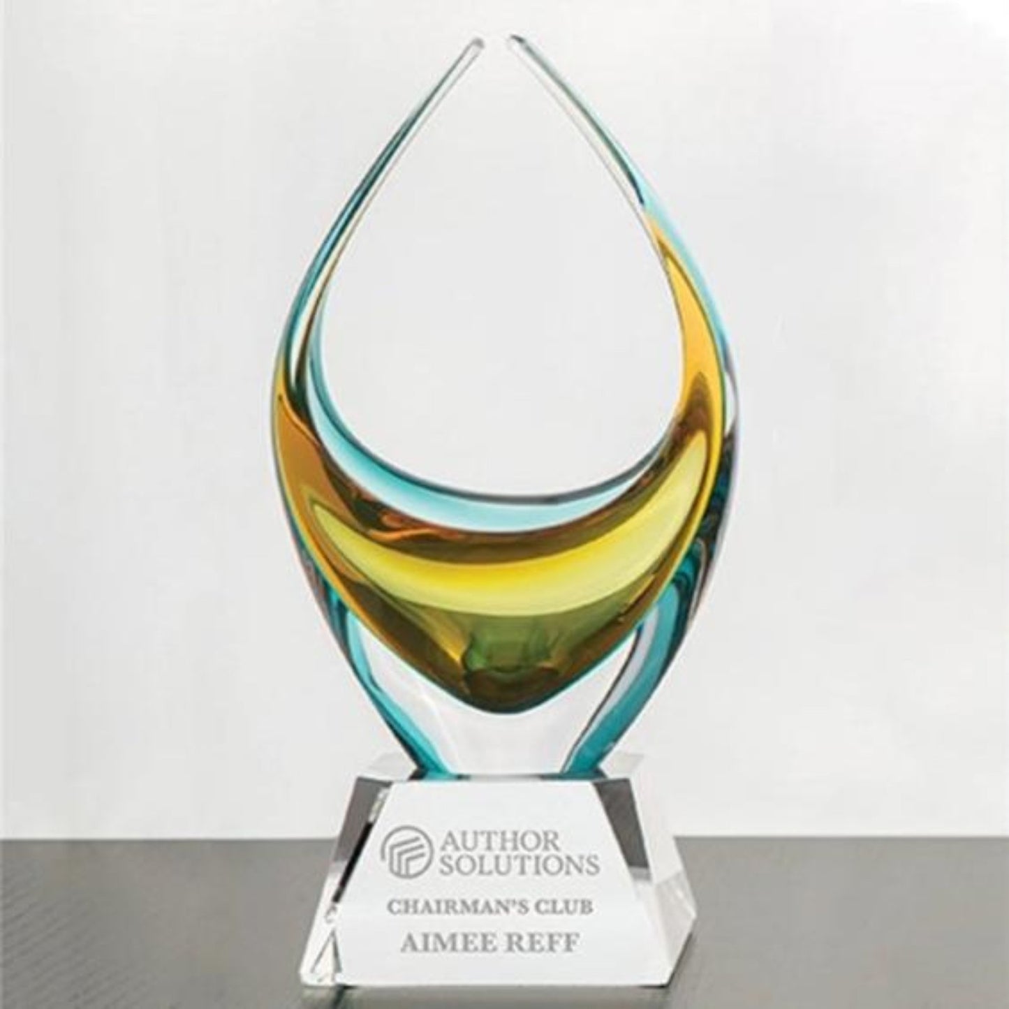 art glass award with bronze and blue