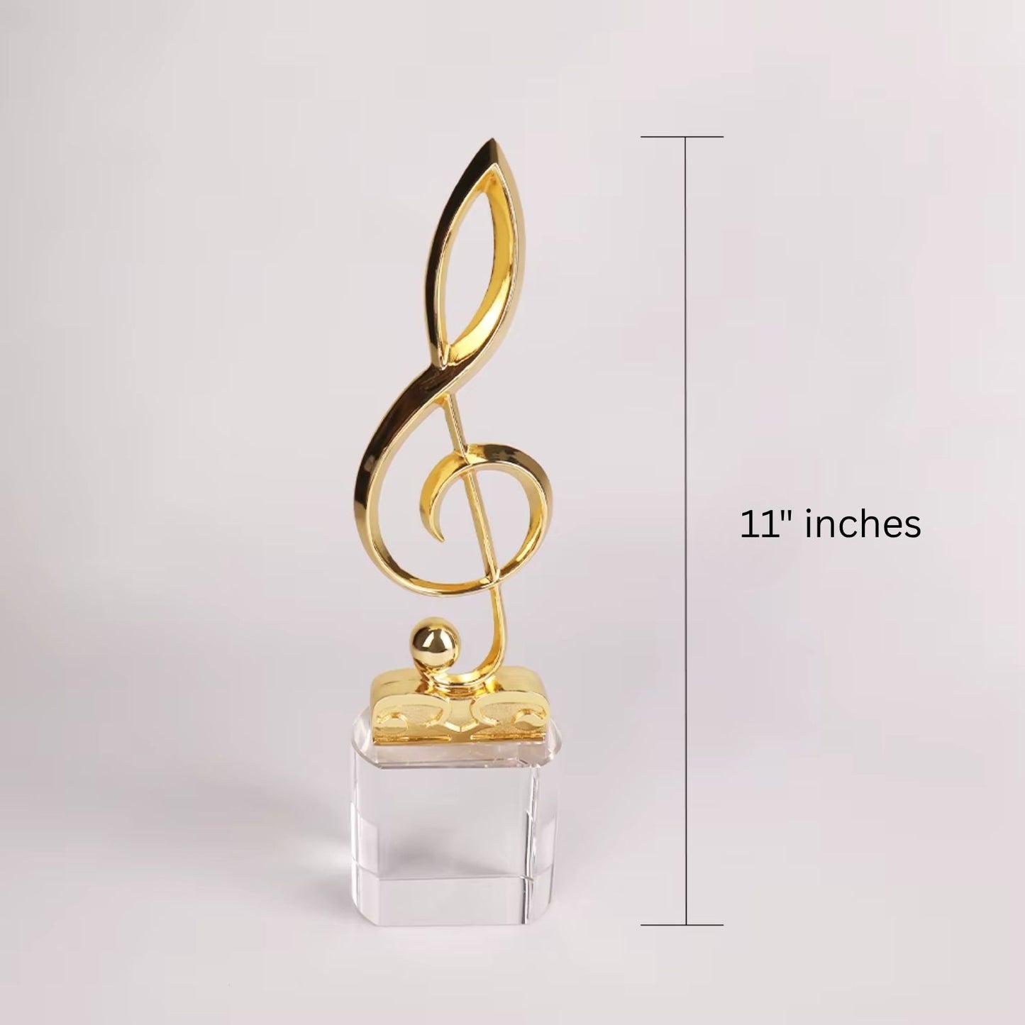 Premio de música con clave de sol grabada sobre base negra