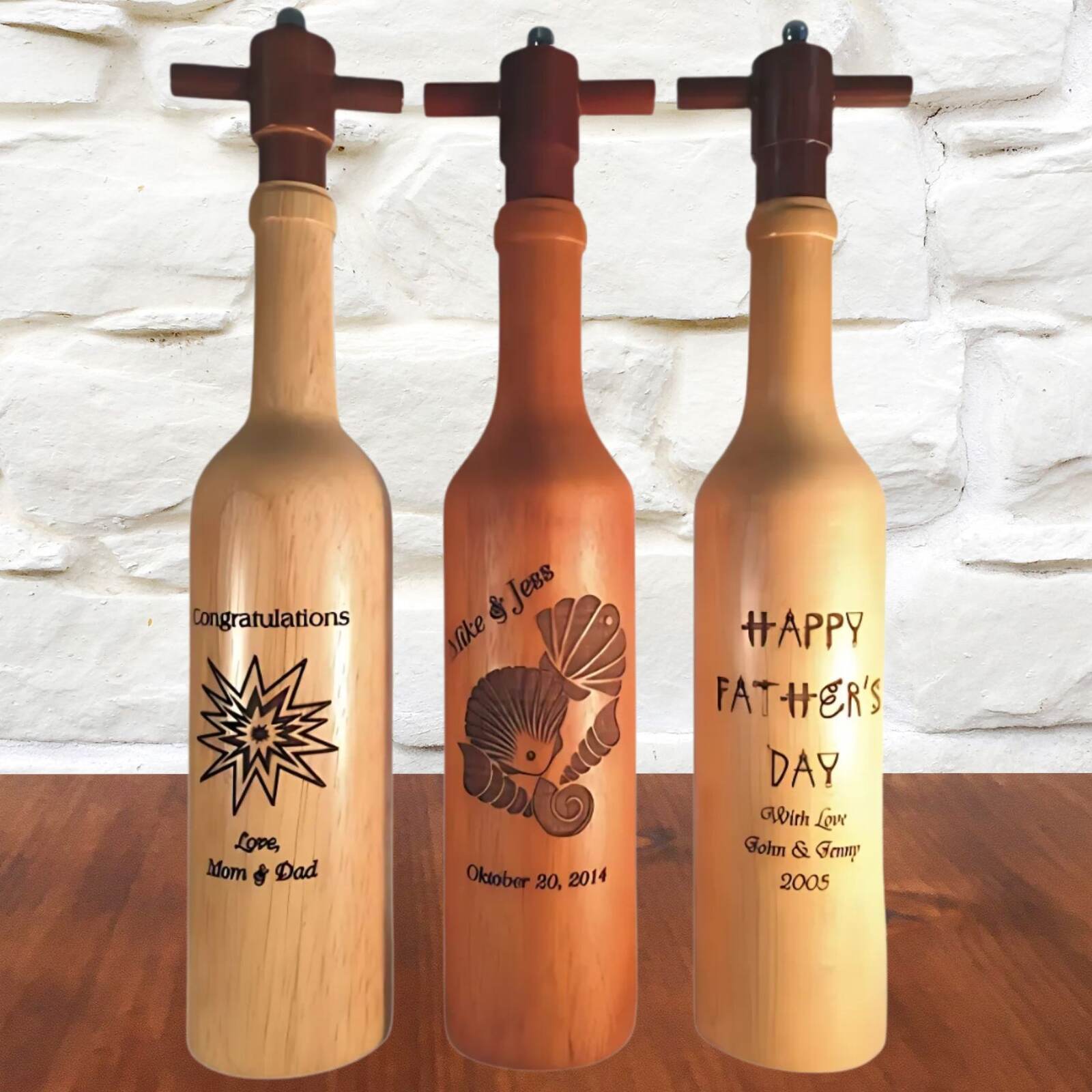 engraved pepper grinders on table