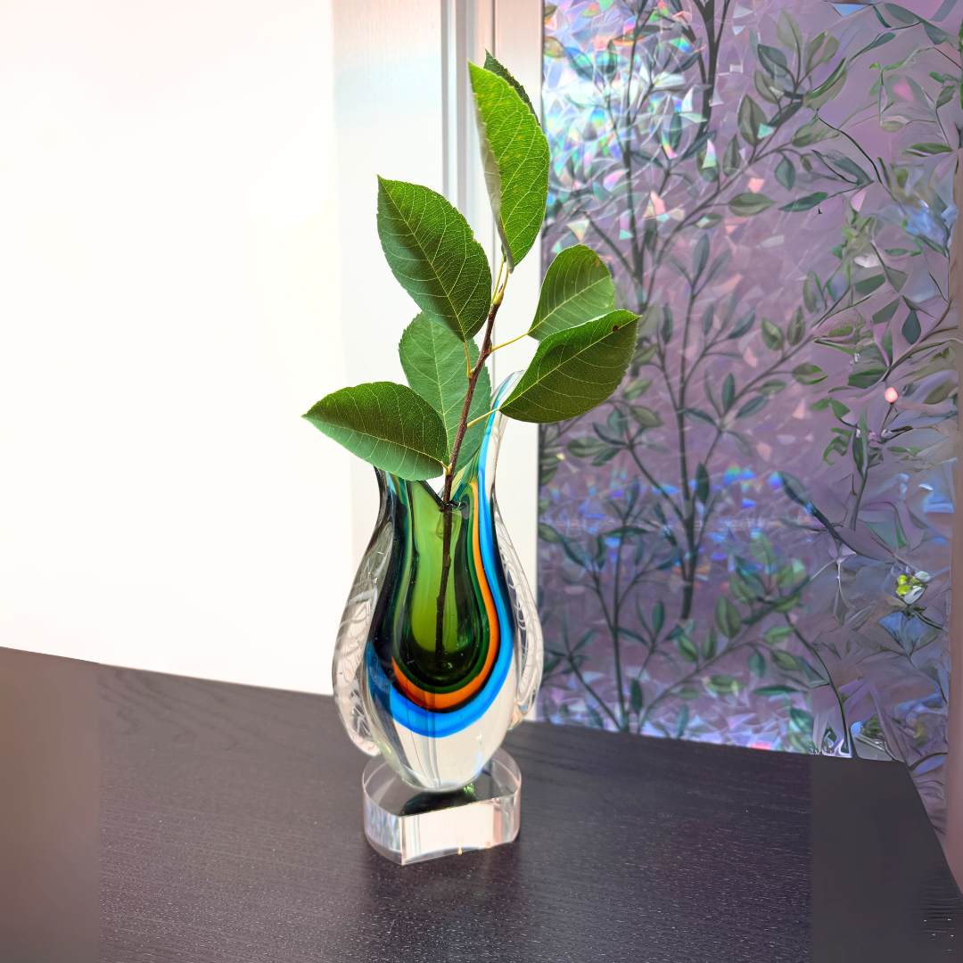blue violet and amber art glass vase on crystal base