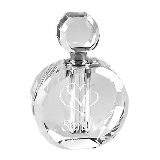 optic crystal perfume bottle with facets and stopper engraved with hearts