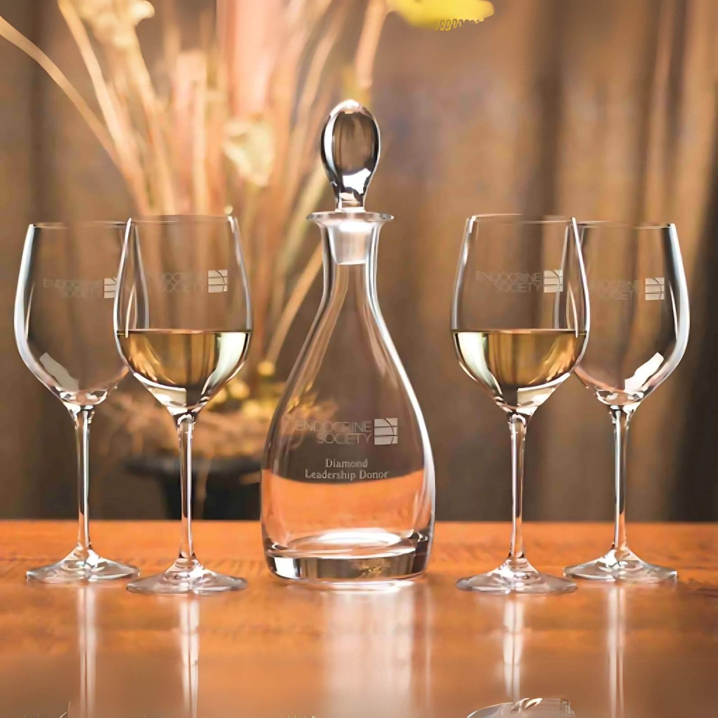 glass wine decanter with 4 stemmed glasses