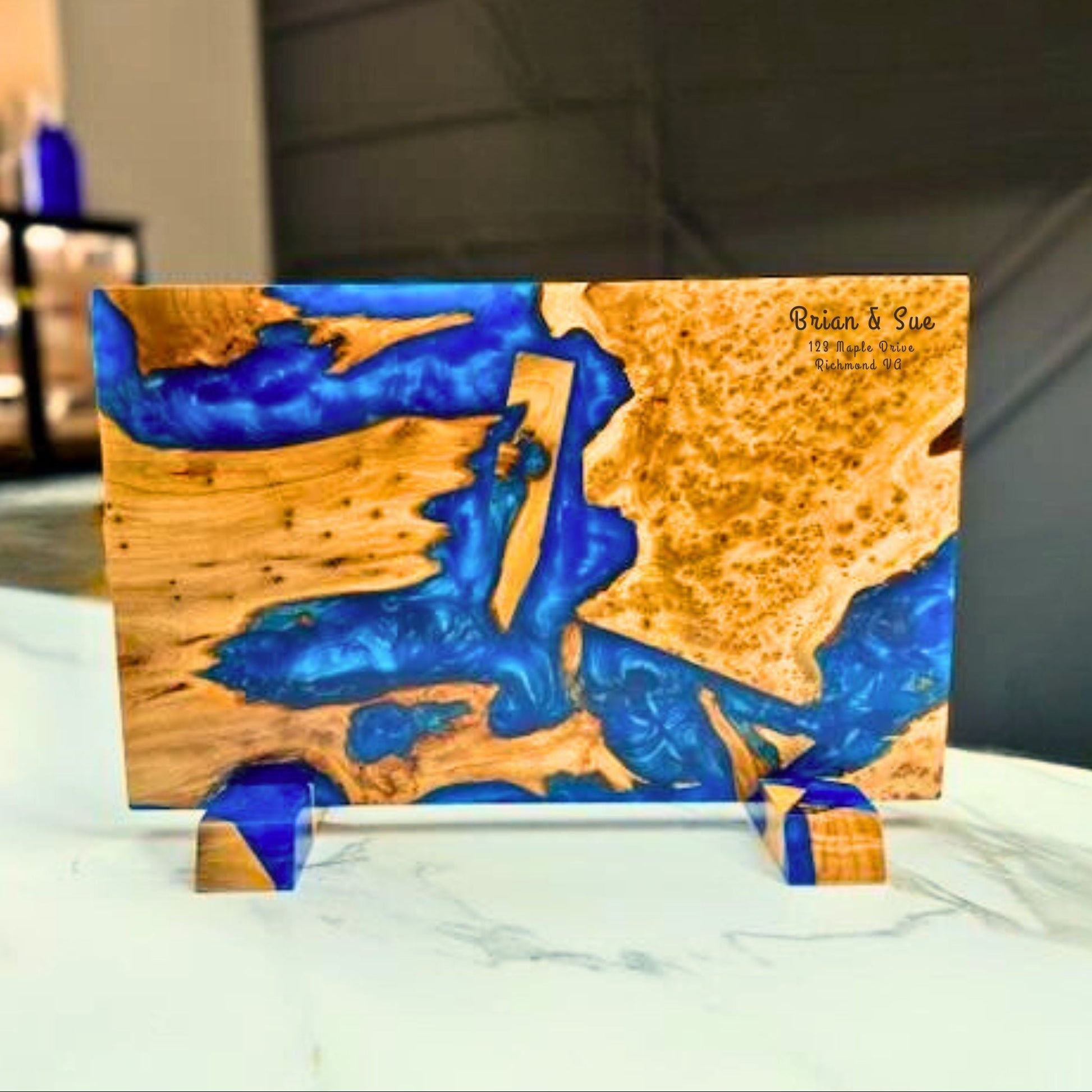 wooden cutting board with artistic blue inlay
