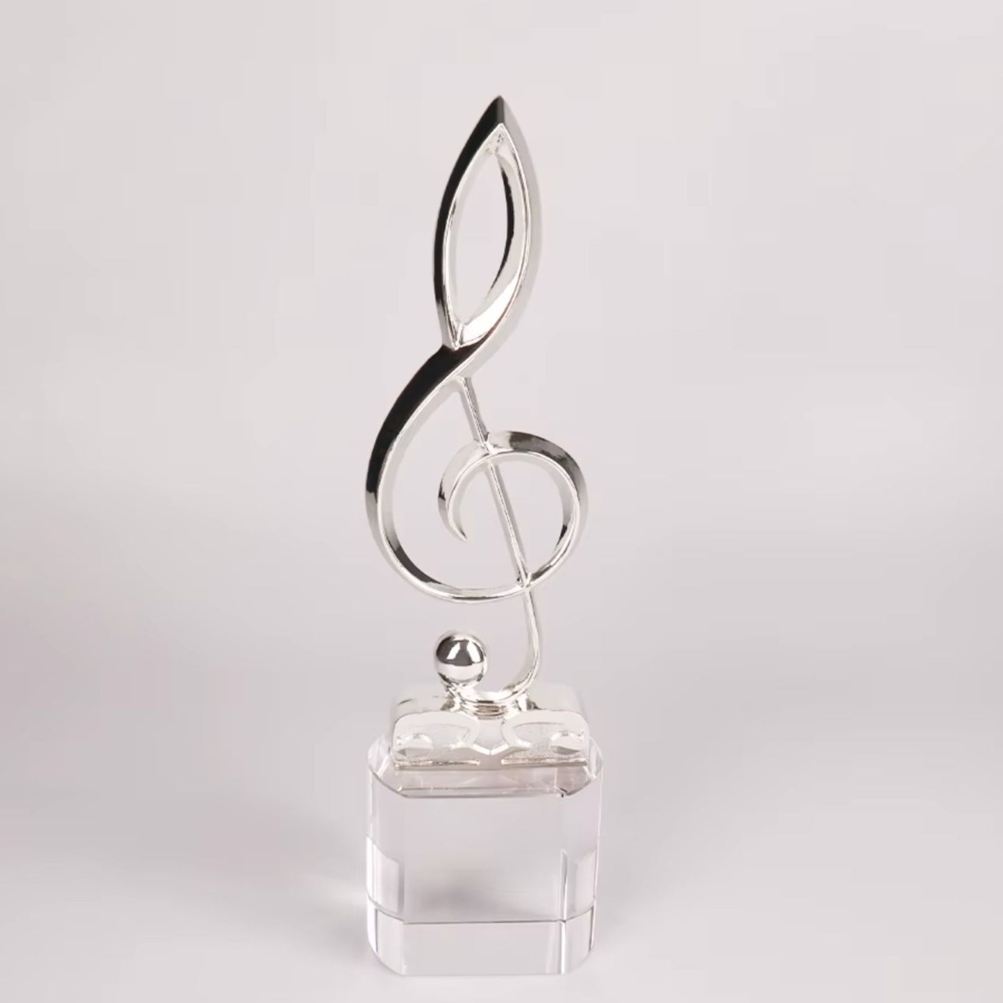 treble clef design on engraved base