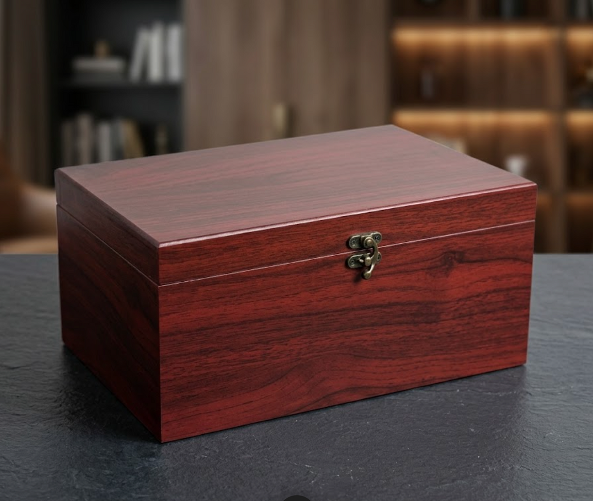 Reddish-brown wooden keepsake box displayed on a dark tabletop