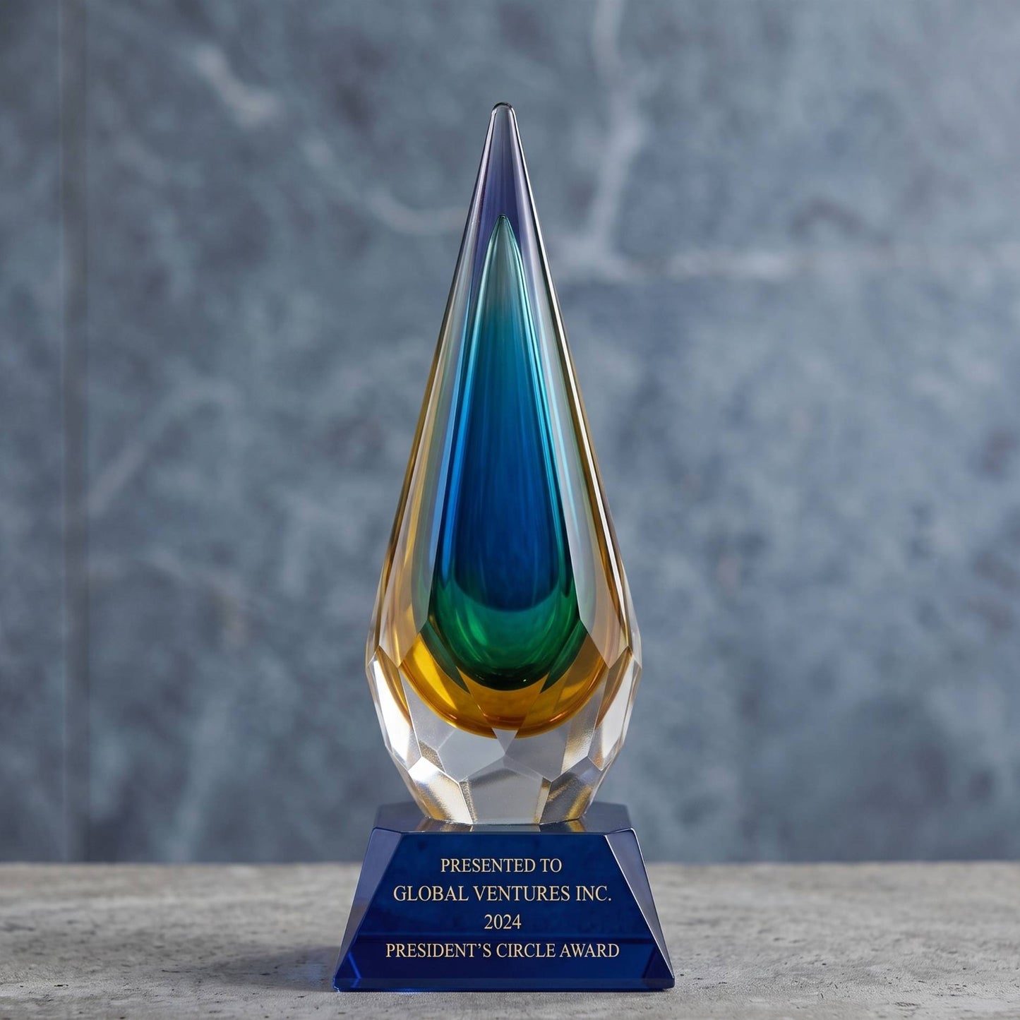 Glass award with blue and green gradient on a gray surface and background