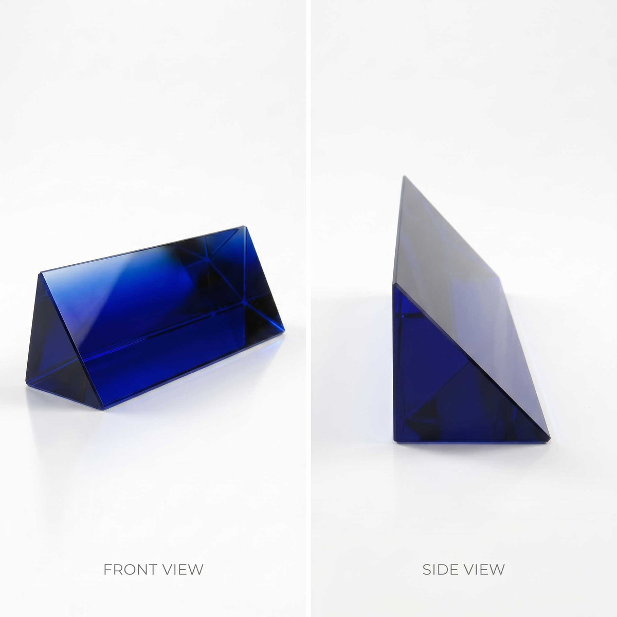 A split-screen product image showing a transparent blue geometric prism block from two angles: 'FRONT VIEW' on the left and 'SIDE VIEW' on the right, set against a clean white background.