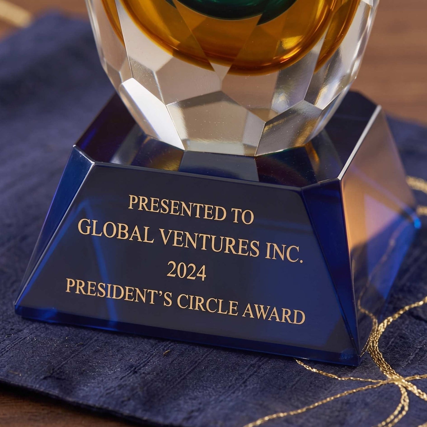 Closeup of blue base for teardrop award