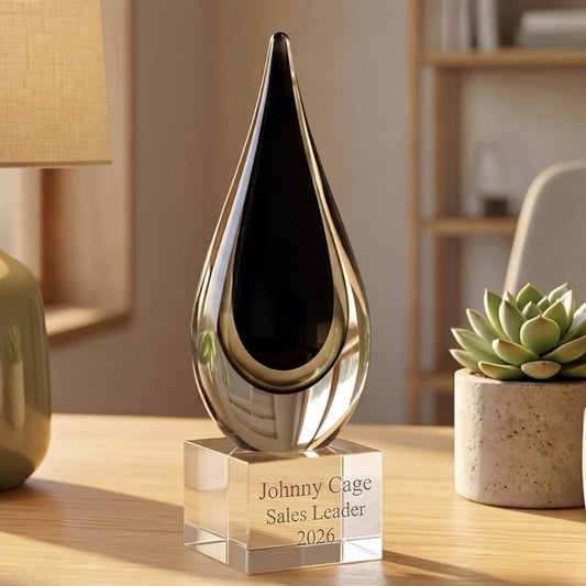 black art glass teardrop on crystal base