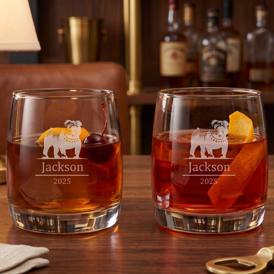 engraved modern styled cocktail glasses on a desk with an upscale home bar