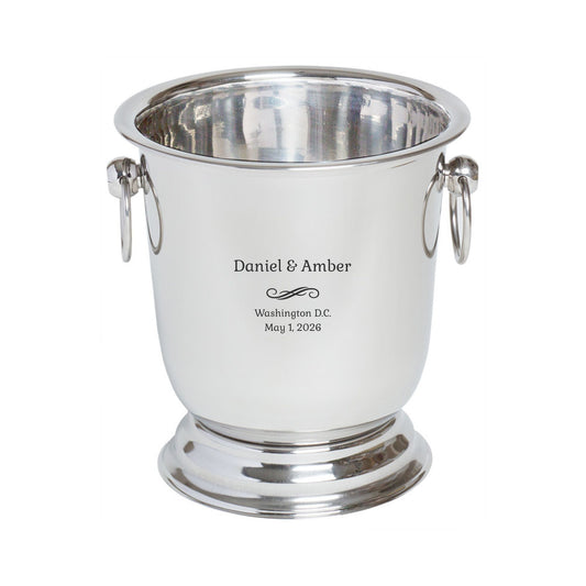 Silver wine cooler with engraved text on a white background