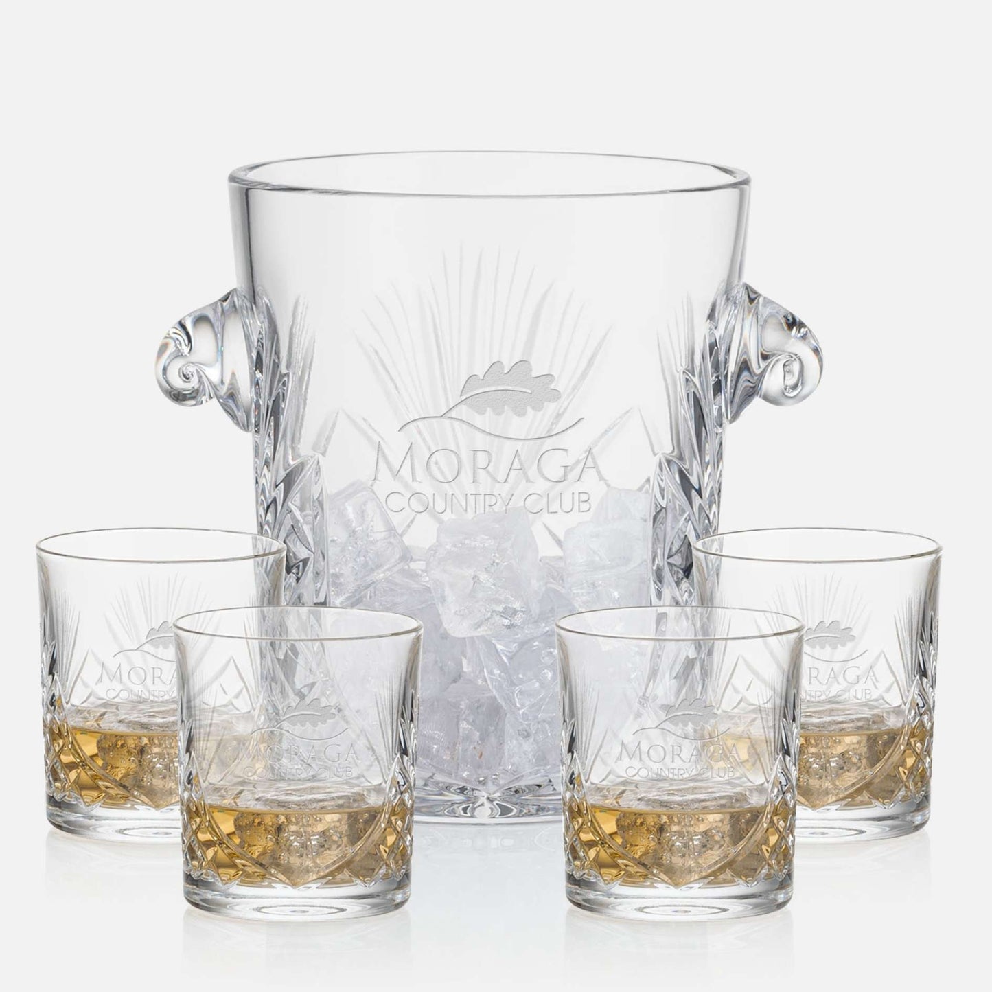 cut crystal ice bucket with 4 on the rocks glasses engraved with logo on white background