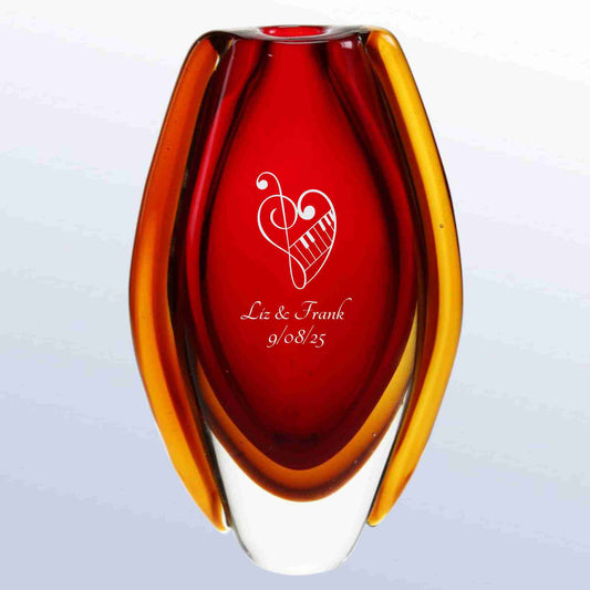 Colorful glass vase with engraved heart design and text 