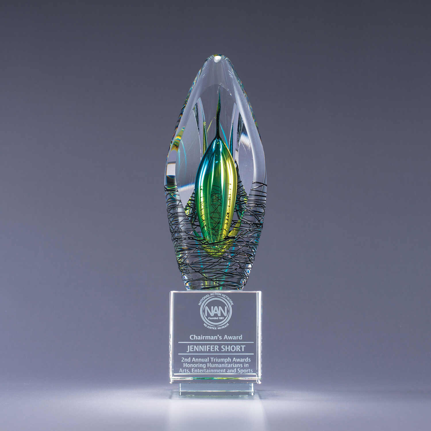 art glass award with green and blue