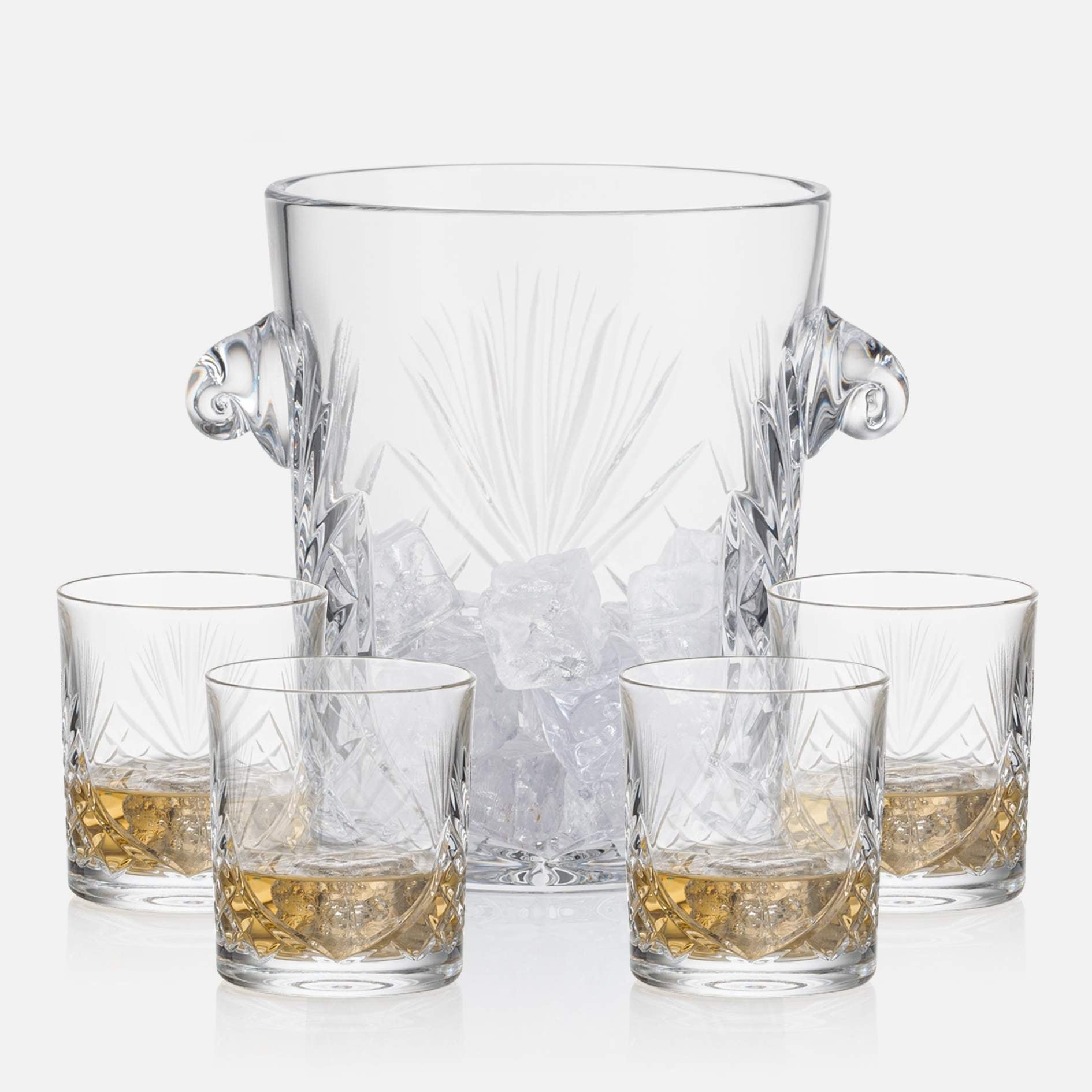 cut crystal ice bucket with 4 on the rocks glasses on white background