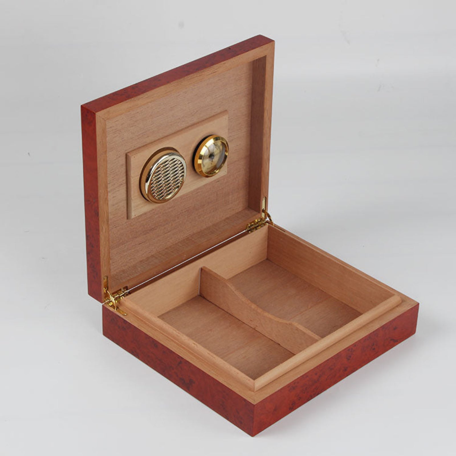 Wooden humidor with gold accents on a white background