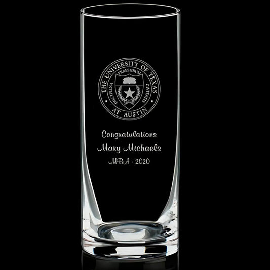 Clear glass with engraved text and logo on a black background