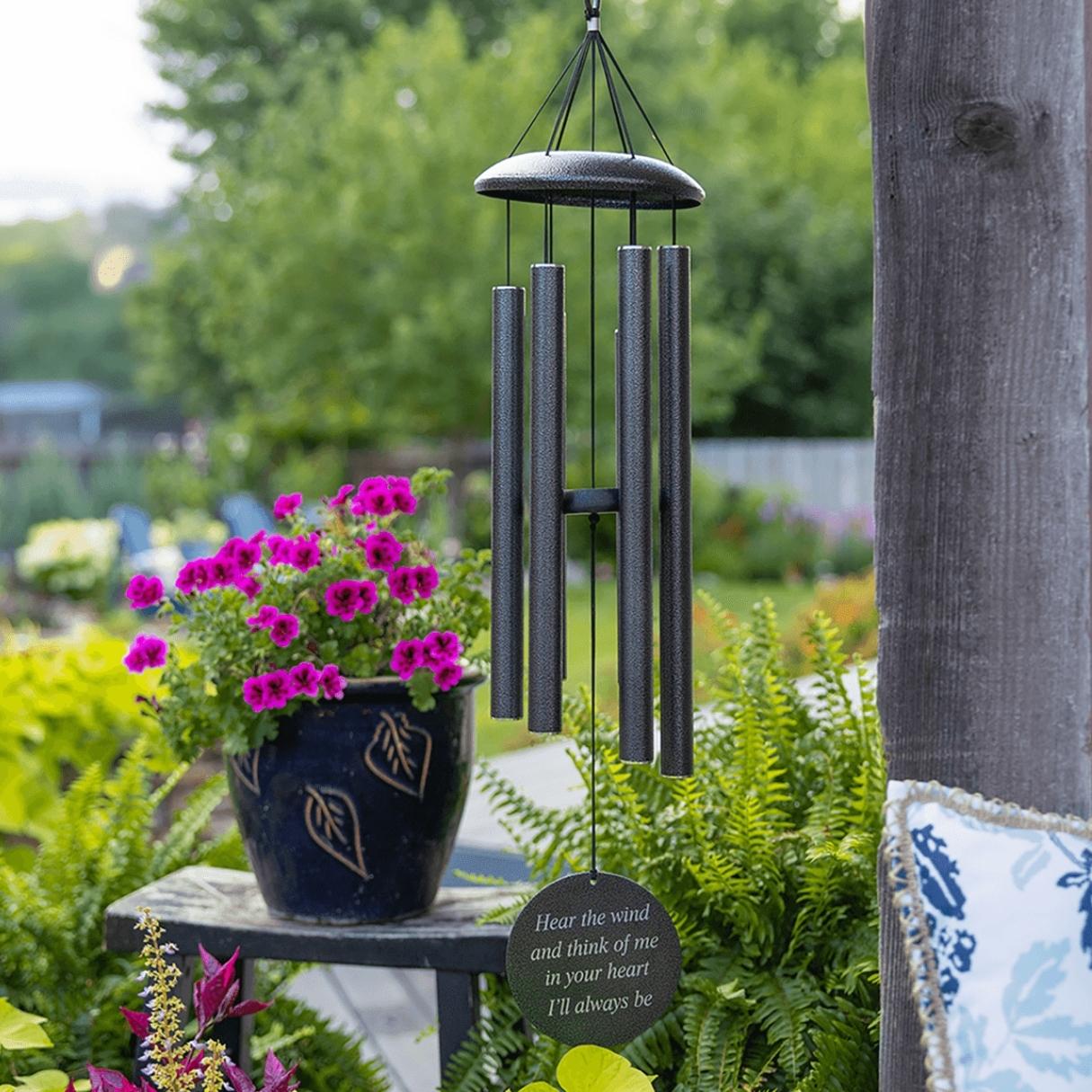 metal wind chime in garden personalized with message