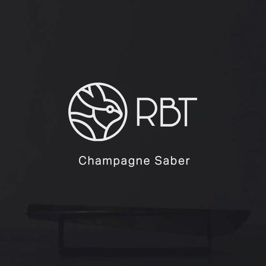 video on how to open a champagne bottle with a saber