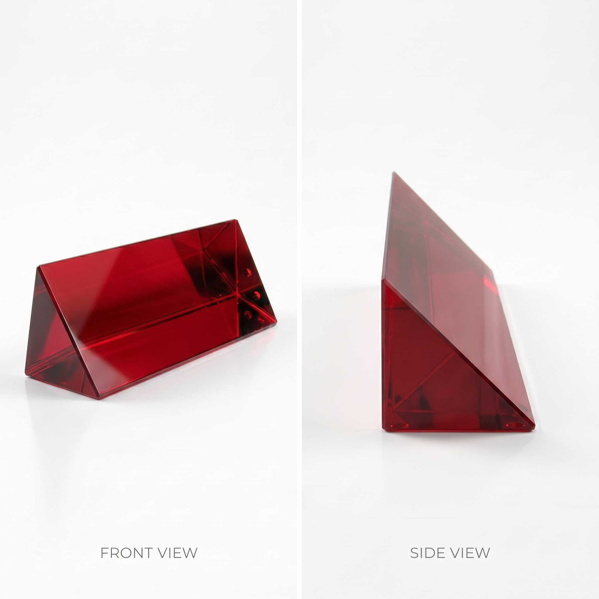 A split-screen product photograph of a translucent red crystal name plate triangular prism block, showing both front and side views on a clean white background with text labels.