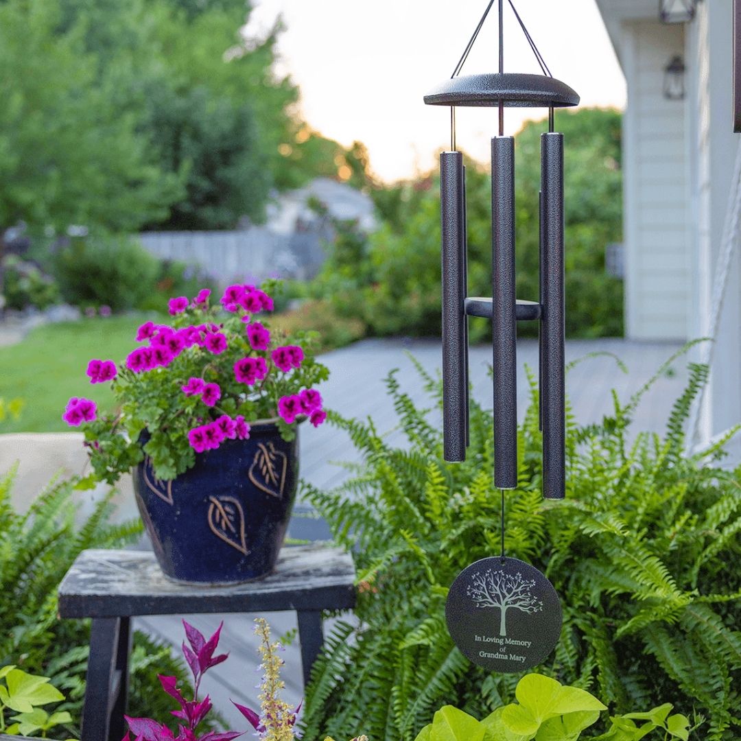 metal wind chime in garden personalized with message and logo